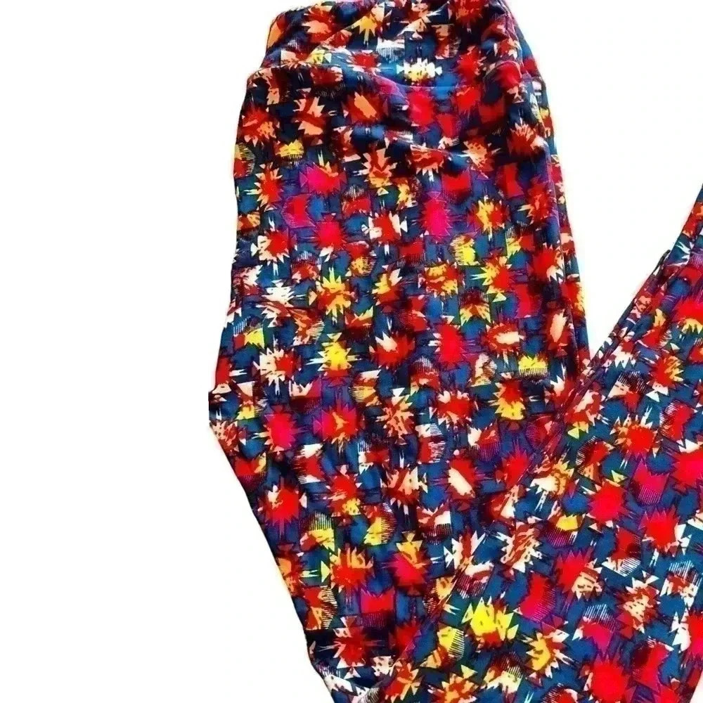 Lularoe TC teal aztec leggings with orange, yellow , white. NWOT.